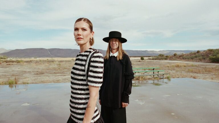The Bride Wore 4 Vintage Dresses and a Custom Letterman Jacket For Her California Desert Wedding